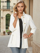 Load image into Gallery viewer, Woman wearing a tailored utility jacket with gold buttons, zip pockets, and cinched waist