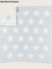 Load image into Gallery viewer, Soft plush Barefoot Dreams receiving blanket featuring an all-over star pattern with reversible design