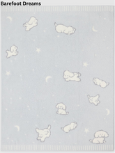 Load image into Gallery viewer, Soft plush blanket featuring scattered playful puppies, moons, and stars pattern