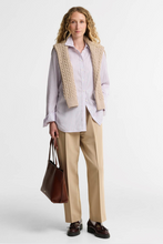 Load image into Gallery viewer, Woman wearing Barbour Evangeline Frosted Stripe shirt styled with knit vest and tailored trousers