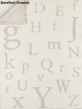 Load image into Gallery viewer, Barefoot Dreams soft plush baby blanket featuring scattered alphabet letters in varying sizes