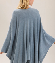 Load image into Gallery viewer, Woman wearing an oversized cozy knit wrap cardigan with wide draped sleeves, back view