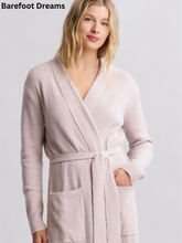 Load image into Gallery viewer, Woman wearing a cozy, soft ribbed belted robe with front pockets by Barefoot Dreams