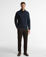 Load image into Gallery viewer, Man wearing Barbour Guy Half Zip pullover with quarter-zip neckline, styled with wool trousers