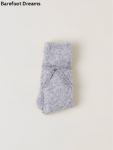 Load image into Gallery viewer, Barefoot Dreams plush fuzzy socks folded and tied with a branded satin ribbon bow