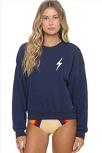 Load image into Gallery viewer, Navy blue relaxed crew sweatshirt with white lightning bolt chest graphic