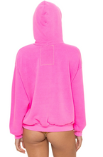 Load image into Gallery viewer, Back view of an oversized pullover hoodie with ribbed cuffs and hem detail