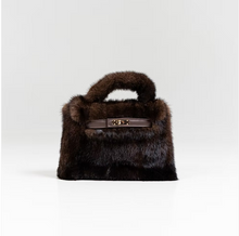 Load image into Gallery viewer, Luxurious mink fur handbag with a structured top handle and gold-tone clasp closure