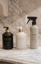 Load image into Gallery viewer, L'AVANT Collective Fresh Linen hand soap, dish soap, and multipurpose cleaner on marble