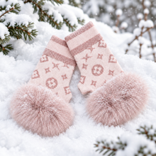 Load image into Gallery viewer, Fingerless knit gloves featuring luxury monogram pattern with fluffy faux fur pompom trim cuffs