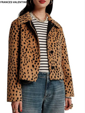 Load image into Gallery viewer, Woman wearing a cheetah print short jacket over a striped top with jeans