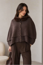 Load image into Gallery viewer, Oversized wool poncho cardigan with fur collar and decorative buttons, paired with wide-leg trousers