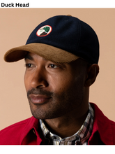Load image into Gallery viewer, Navy wool baseball cap with tan corduroy brim and Duck Head circle patch logo