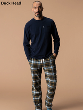 Load image into Gallery viewer, Man wearing Duck Head long sleeve top and plaid drawstring lounge pants set