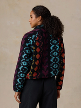 Load image into Gallery viewer, Woman wearing a cozy patterned fleece pullover with bold geometric and floral print, back view