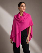 Load image into Gallery viewer, Wide hot pink cashmere travel scarf draped as shawl over black outfit