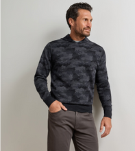 Load image into Gallery viewer, Man wearing a reversible camo pattern pullover hoodie with ribbed cuffs and hem