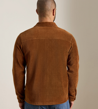 Load image into Gallery viewer, Man wearing a relaxed-fit corduroy knit chore coat shown from the back