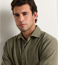 Load image into Gallery viewer, Man wearing a Peter Millar Aspen Corduroy Sport Shirt with subtle ribbed texture and button placket