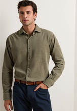 Load image into Gallery viewer, Man wearing a long-sleeve corduroy button-up sport shirt with a classic collar
