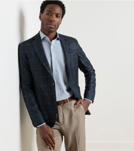 Load image into Gallery viewer, Man wearing a plaid windowpane sport jacket with chinos and a dress shirt