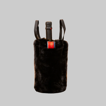 Load image into Gallery viewer, Pretty Rugged faux fur wine tote bag holding a bottle at an elegant dinner party