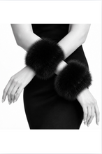 Load image into Gallery viewer, Luxurious fox fur wrist cuffs worn as elegant accessories on a model in an evening dress
