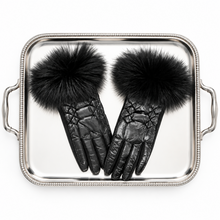 Load image into Gallery viewer, Quilted leather gloves featuring luxurious fluffy fox fur trim cuffs displayed on silver tray