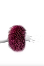 Load image into Gallery viewer, Fuchsia fox fur cuff bracelet worn on a wrist, bold magenta fluffy texture