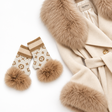 Load image into Gallery viewer, Luxurious monogram knit gloves featuring fluffy fox fur pompom trim, displayed with matching coat