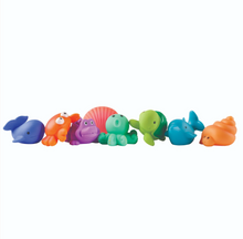 Load image into Gallery viewer, Set of eight ocean creature bath squirt toys including whale, crab, octopus, turtle, and shell figures