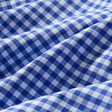 Load image into Gallery viewer, Close-up of a checkered gingham fabric showing texture and weave pattern detail