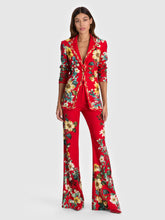 Load image into Gallery viewer, Model wearing a fitted red floral blazer with long sleeves and a single-button closure