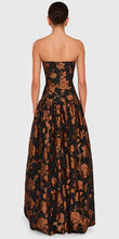 Load image into Gallery viewer, Back view of strapless floral jacquard ball gown with fitted bodice and full skirt