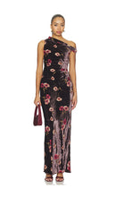 Load image into Gallery viewer, Model wearing a one-shoulder velvet floral maxi gown with ruched waist detailing