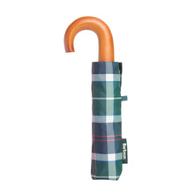 Load image into Gallery viewer, Barbour tartan mini folding umbrella with tan curved handle, shown closed in carry sleeve