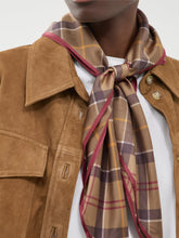 Load image into Gallery viewer, Barbour Kinsale muted tartan scarf tied loosely around neck over suede jacket