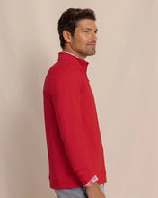 Load image into Gallery viewer, Man wearing a quarter-zip pullover sweatshirt with plaid collar detail, side view