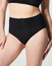 Load image into Gallery viewer, Model wearing high-waisted smoothing brief underwear with seamless construction and full coverage