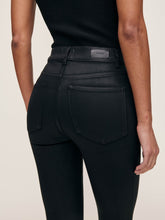 Load image into Gallery viewer, Back view of high-rise coated skinny crop jeans with patch pockets on female model