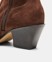Load image into Gallery viewer, Close-up rear view of a brown suede ankle boot with stacked block heel and side zipper