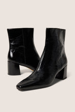 Load image into Gallery viewer, Pair of black patent leather ankle boots with block heel and square toe