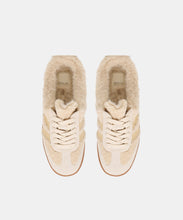 Load image into Gallery viewer, Top-down view of a pair of shearling-lined lace-up sneakers with gum sole