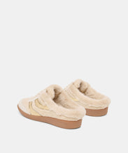 Load image into Gallery viewer, Back view of fur-lined slip-on mule slippers with gold detail stripe and rubber sole