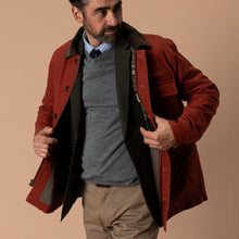 Load image into Gallery viewer, Man modeling an open duck canvas barn coat with dark collar and interior lining detail