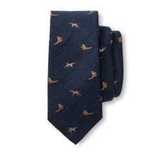 Load image into Gallery viewer, Navy blue wool silk tie featuring embroidered hunting dog and pheasant motifs throughout
