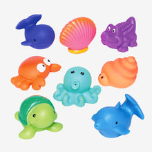 Load image into Gallery viewer, Set of eight colorful rubber sea creature bath toys including turtle, octopus, crab, dolphin, and shells