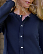Load image into Gallery viewer, Close-up detail of navy button-front sweatshirt cardigan with frayed placket trim