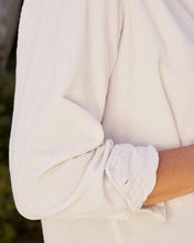 Load image into Gallery viewer, Close-up detail of rolled cuff on a relaxed wide-wale corduroy button-up shirt