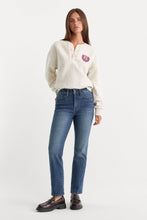 Load image into Gallery viewer, Model wearing straight-leg mid-rise jeans styled with a cream henley sweatshirt and brown loafers